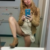 Woman without panties takes a selfie