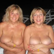 Nude natural tits belonging to two gilfs
